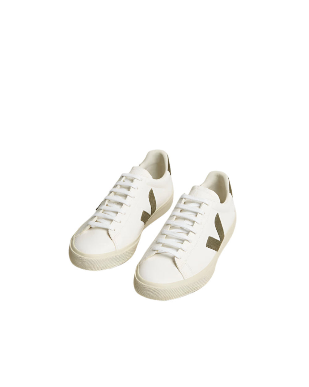 Pair of white sneakers on a light gray background