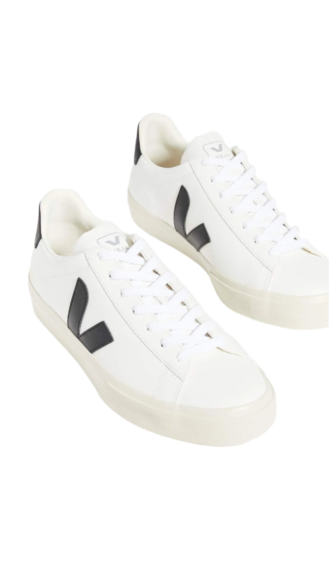 White sneakers with black logo on a white background