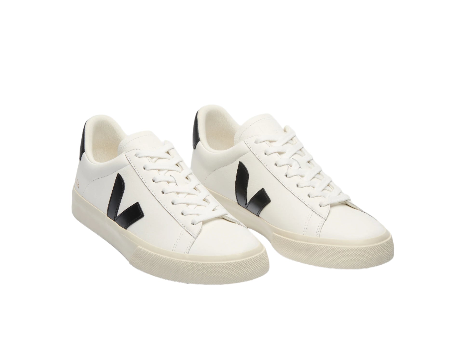 White sneakers with black accents on a white background