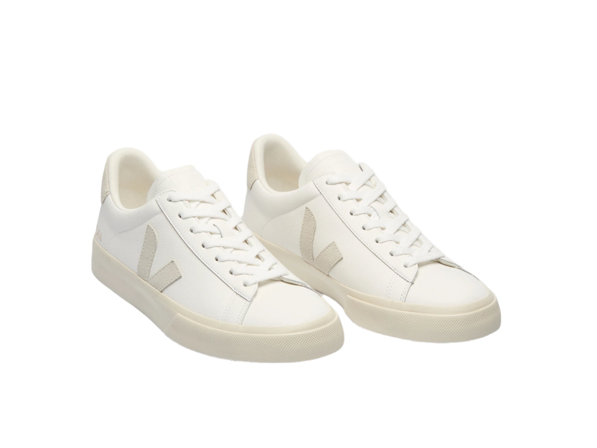 White sneakers with a logo on a light gray background