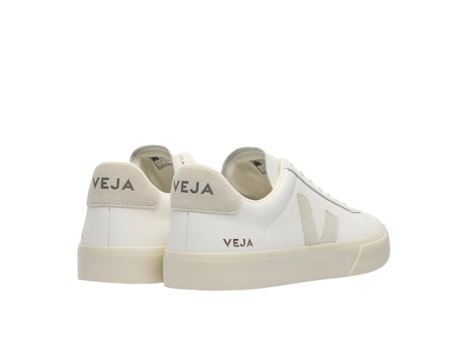 White sneakers with 'Veja' branding on a white background