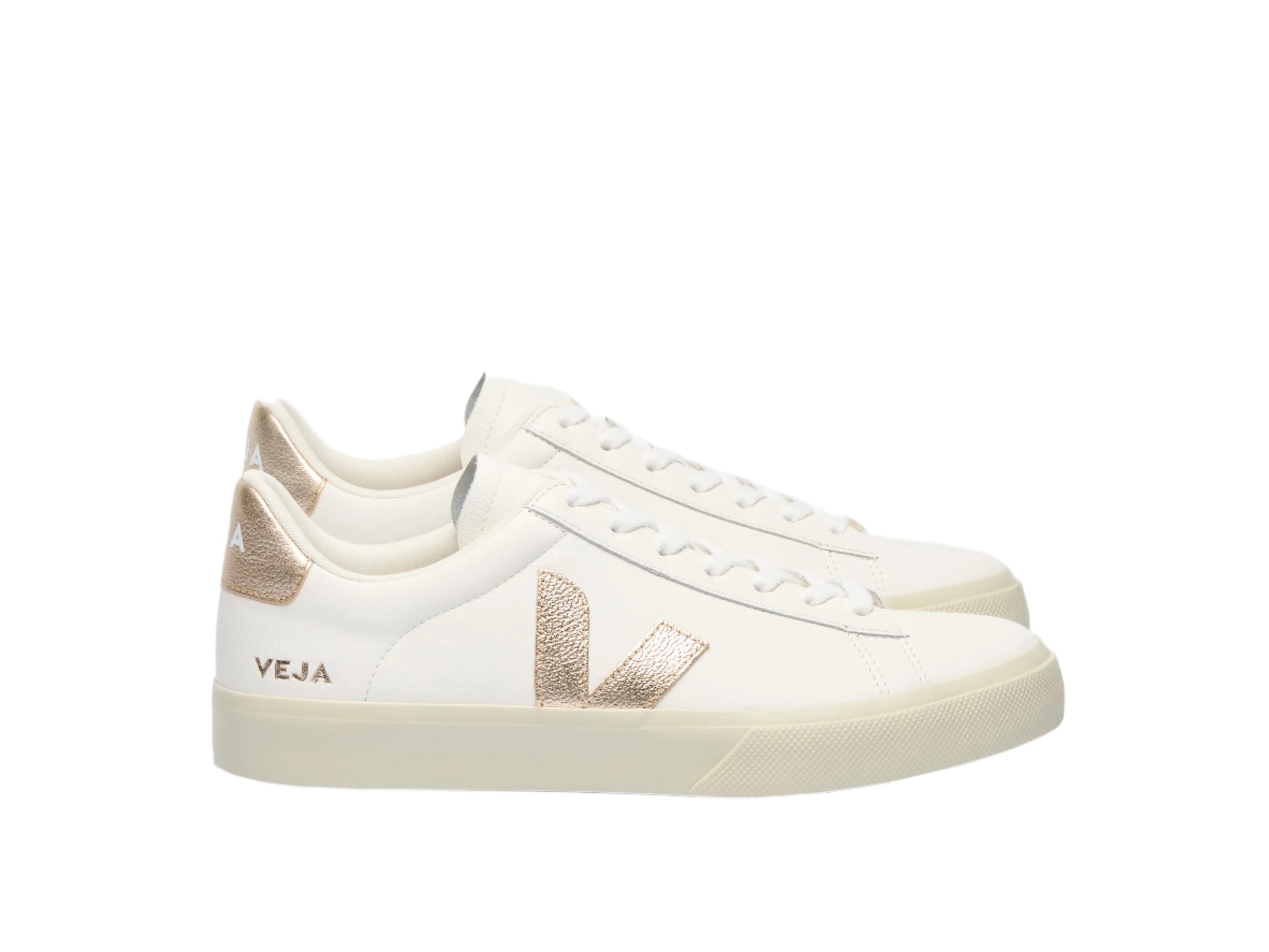 White sneakers with gold accents on a white background